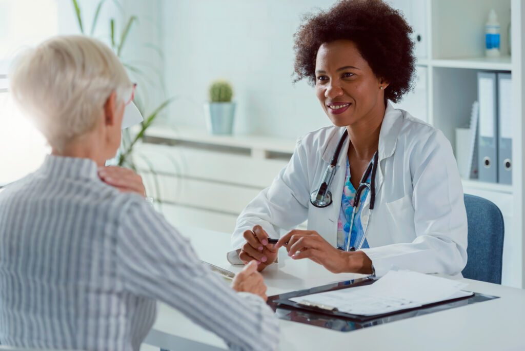 Female Doctor Examining Elderly Patient